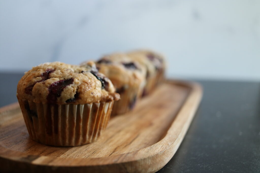 homemade blueberry muffins with cherries